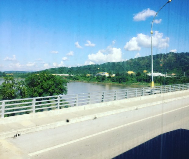 a bridge between two nations literally. That's Laos to the right and Thailand on your left